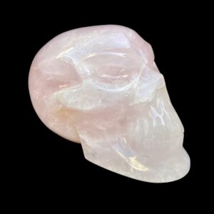 Life-size rose quartz skull