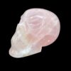 Life-size rose quartz skull