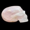 Life-size rose quartz skull