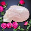 Life-size rose quartz skull