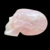 Life-size rose quartz skull