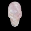 Life-size rose quartz skull