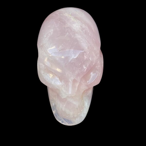 Life-size rose quartz skull