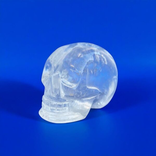 clear-quartz-crystal-skull-4-1.jpg Small Clear Quartz Crystal Skull with Rainbow