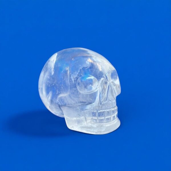 clear-quartz-crystal-skull-5-1.jpg Small Clear Quartz Crystal Skull with Rainbow