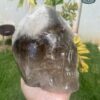 elestial-smoky-quartz-skull8-1.jpeg Elestial smoky quartz skull with green muscovite