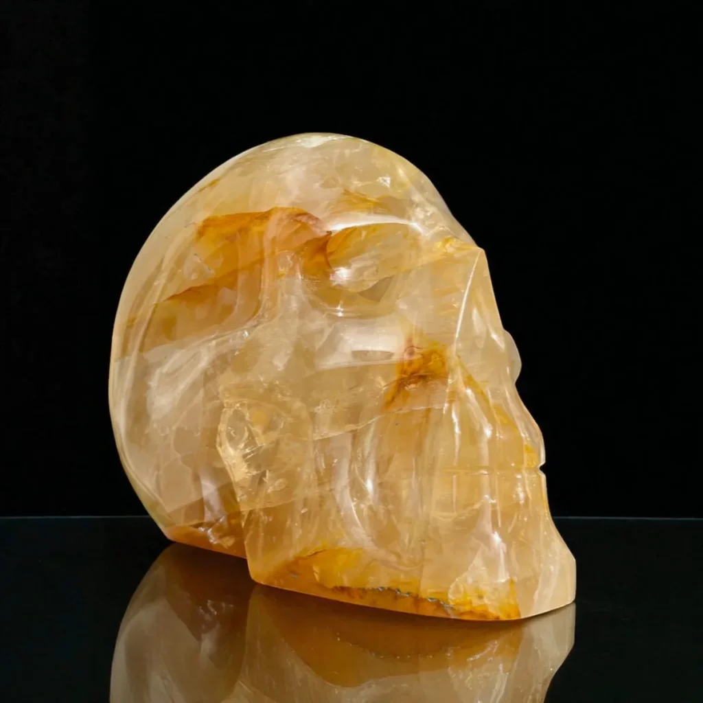 Crystal Skull Meaning: What They Symbolize, And What Each Stone Means 3 Life-size golden healer quartz crystal skull, hand-carved